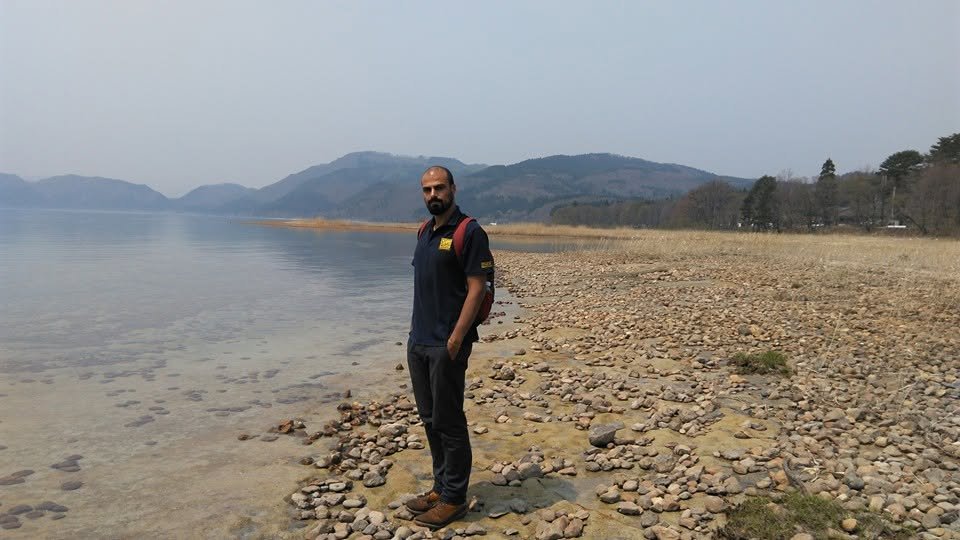 Ahmad Sader, founder of Eagle Spirit Travel, on a lakeshore in Japan