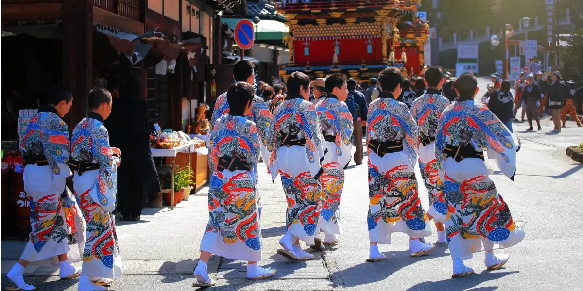 Festival procession in a traditional Japanese mountain town